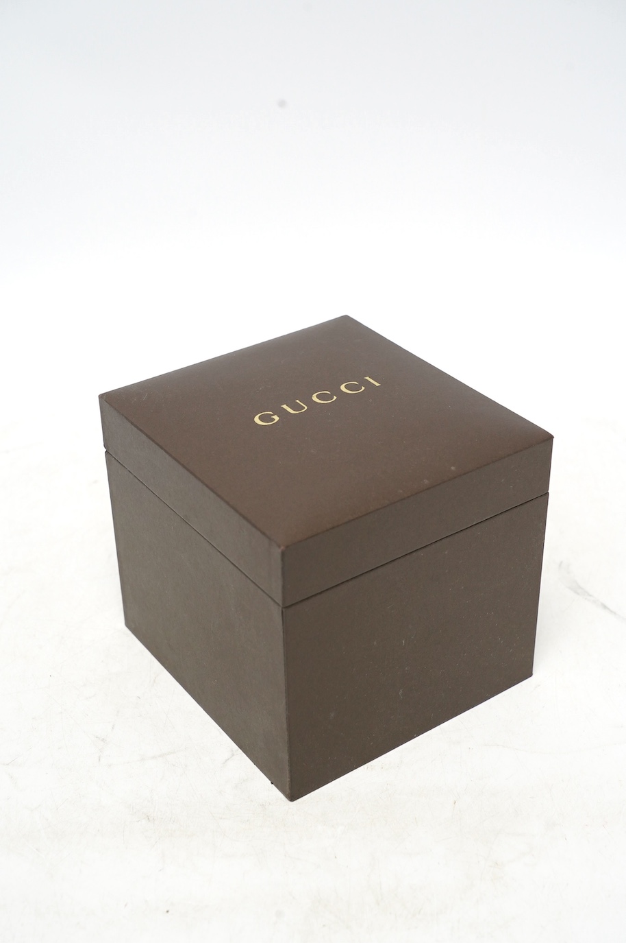 A lady's modern stainless Gucci quartz wrist watch, with date aperture, box and booklet. Condition - fair